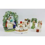 Collection of 19th century Staffordshire figures to include Shepherdess and a couple in an arbour,