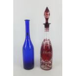 Red stained glass Whisky decanter and stopper together with a blue fruit and vine etched glass