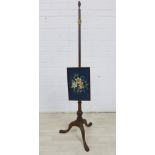 Mahogany pole screen with rectangular tapestry panel and tripod legs, 146cm high