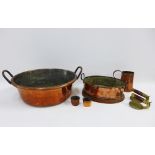 Quantity of copper wares to include a twin handled pan and a Quart tankard etc. together with a pair