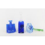 Kosta Boda blue glass bottle and stopper designed by B. Vallien together with Bulgari blue glass