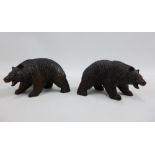 Two Black Forest style carved wooden Bears, modelled standing, each with black and white beaded