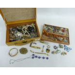 A quantity of vintage costume and other jewellery contained within a leather jewel box (a lot)