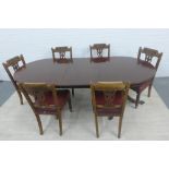 Mahogany twin pedestal dining table together with a set of six chairs with carved toprails and red