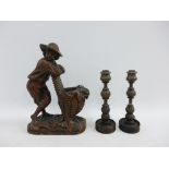 Wooden carved figure of a boy and a garden chair together with a pair of wooden knop stemmed