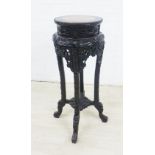 Chinese jardiniere table stand with a red marble hard stone circular top over elaborately carved