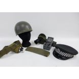 A collection of military items to include WWII US telescope elbow sight M17 JKC, 1942, vintage