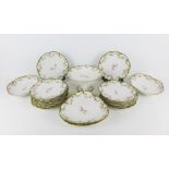 Limoges porcelain dessert service with pink rose pattern and green and gilt borders, comprising