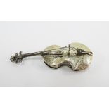 Novelty white metal pill box in the form of a violin, unmarked tests as silver, 7cm long