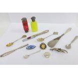 Collection of silver items to include teaspoons, butter knife, silver topped scent bottles and a