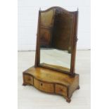 19th century mahogany dressing mirror with a serpentine base with three drawers, on bracket feet, 56