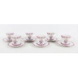 Set of six Kennedy MacPherson porcelain demi tasse cups and saucers, (6)