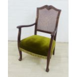 Open arm chair with cane work back and upholstered seat, 91 x 60cm