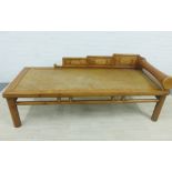 Chinese day bed with woven seat and stylised back rail and arm, 72 x 190cm
