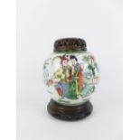 Chinese famille verte jar, with pierced wooden cover and stand, height overall 18cm