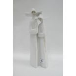 Lladro porcelain figure group of two Nuns, with printed backstamps, 34cm high