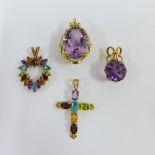 Four various 9ct gold gemset pendants (4)