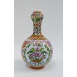 Chinese vases with garlic mouth, painted with flowers in polychrome enamels, with a red Qianlong