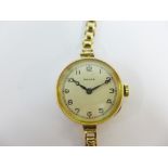Early 20th century lady's 9ct gold cased Rolex wrist watch on a 9ct gold bracelet strap