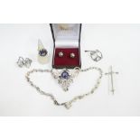A collection of silver and white metal jewellery to include a necklace and matching ring, dagger