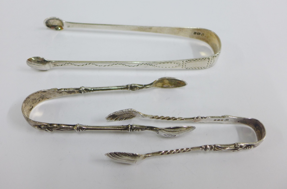 Georgian silver sugar tongs, makers mark WC together with Victorian silver sugar tongs and