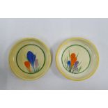 Clarice Cliff Bizarre pair of Crocus pattern pin dishes, with printed backstamps, 8cm diameter (2)