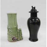 Chinese black glazed vase and cover with dog finial together with a celadon glazed bamboo vase,