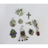 A collection of ten various silver pendants (10)