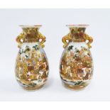 Pair of Japanese Satsuma earthenware vases, with gild handles and painted with figures, character