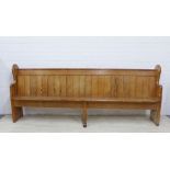 Long pine pew with planked back and shaped side supports, 95 x 240cm