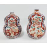 Pair of Chinese Imari double gourd vases, typically painted with birds, flowers and foliage, 16cm