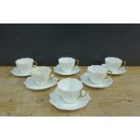 Set of six paragon china white glazed coffee cups and saucers, (12)