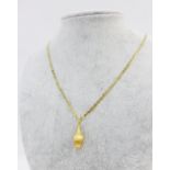 18ct gold necklace with an 18ct gold pendant, both stamped 750