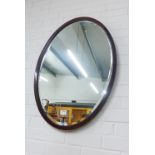 Mahogany framed oval wall mirror, 89 x 61cm