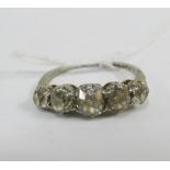 Early 20th century 18ct white gold diamond ring, claw set with five graduated diamonds, UK ring size