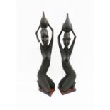 Pair of African carved hardwood Ashanti kneeling female figures, 66cm high (2)