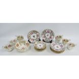 English porcelain teaset comprising eight cups, six saucers, eight side plates and a slop bowl, (a