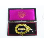 Victorian Masonic gilt metal 'Yorkshire & E. Riding' jewel, in fitted case, 7cm long
