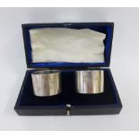 George V pair of silver napkin rings, Sheffield 1916, in fitted case, (2)