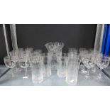 Collection of early 20th century star etched drinking glasses and a frilled rim vase of similar