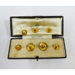 Cased set of gold plated shirt studs together with three 9ct gold studs (a lot)