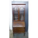 Mahogany bureau bookcase with cornice top and pair of glazed doors over a fall front and three