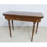 19th century mahogany and inlaid fold over table on turned legs, 76 x 107cm