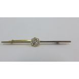 18ct gold diamond bar brooch, millegrain set with nine bright cut diamonds in the form of a