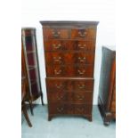 Mahogany veneered tallboy chest with a dentil frieze over two short and six long drawers, on bracket