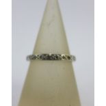 Unmarked white gold diamond set full eternity ring, UK ring size M