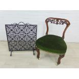 19th century mahogany framed nursing chair with green velvet upholstered seat together with a