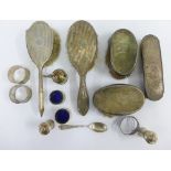 Mixed lot of silver items to include silver backed brushes, pepper pots, salts, etc (a lot)