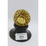 Carved ivory ball depicting '1000 rats' on a hardwood stand, approx 6cm wide