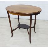 Edwardian mahogany two tier occasional table with oval top, 75 x 77cm